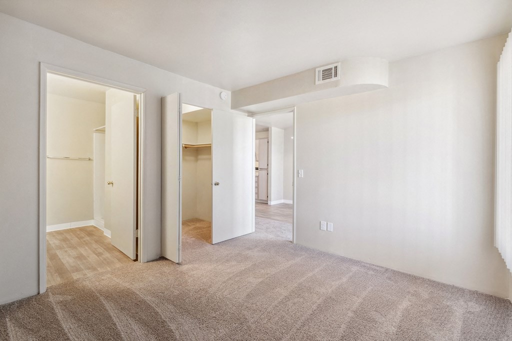 Bedroom and Walk-in Closetat Copper Ridge Apartments in Kingman Arizona