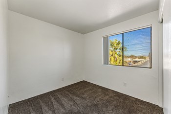 Bedroom at Metro Tucson Apartments - Photo Gallery 23