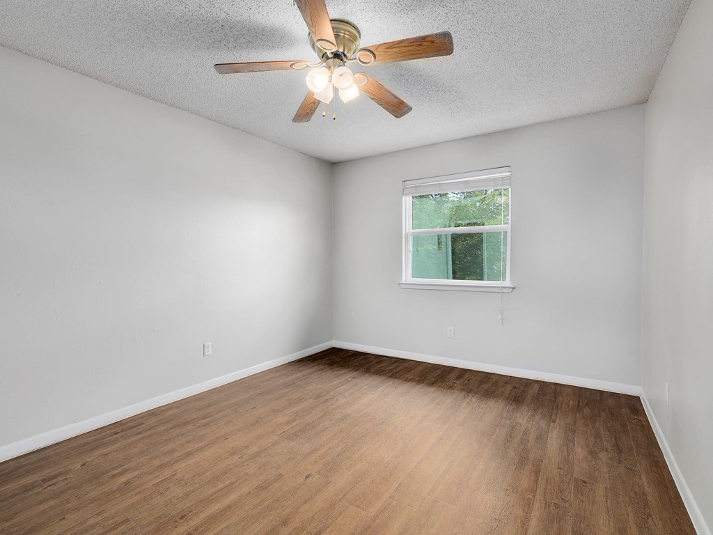 Bedroom at The Villas at Quail Creek Apartments in Austin Texas June 2021