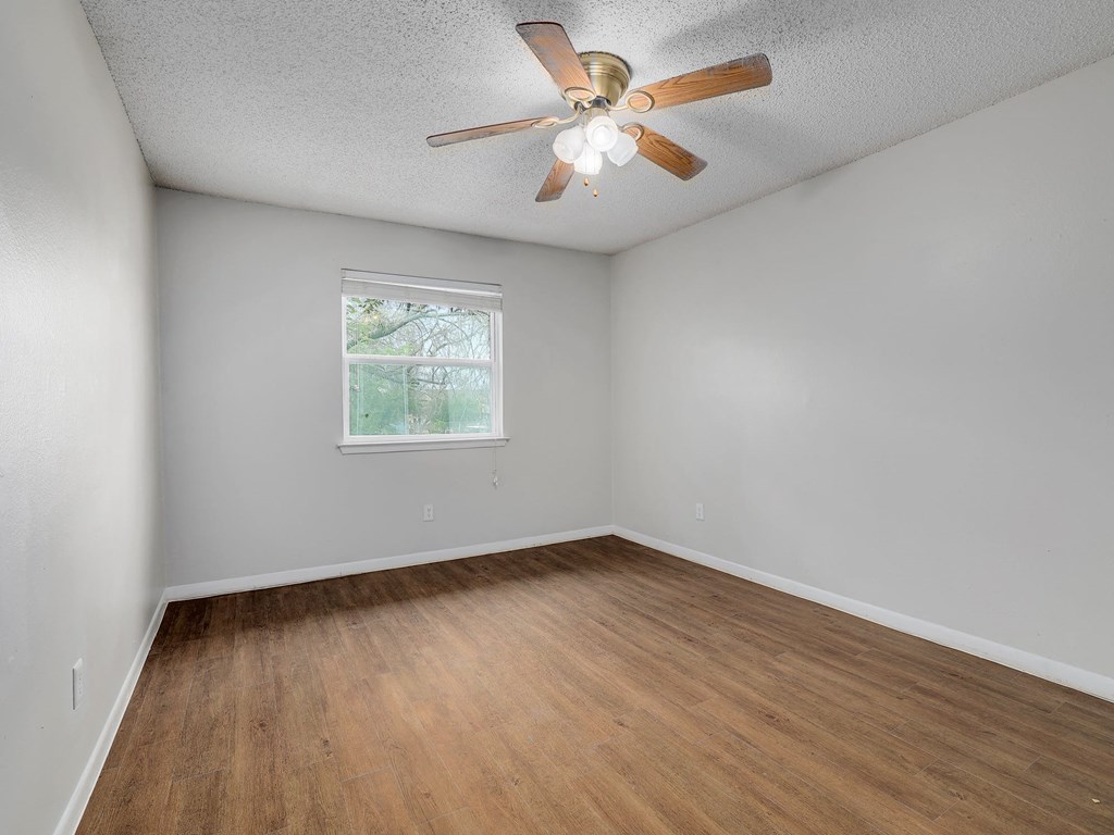 Bedroom at The Villas at Quail Creek Apartments in Austin Texas June 2021