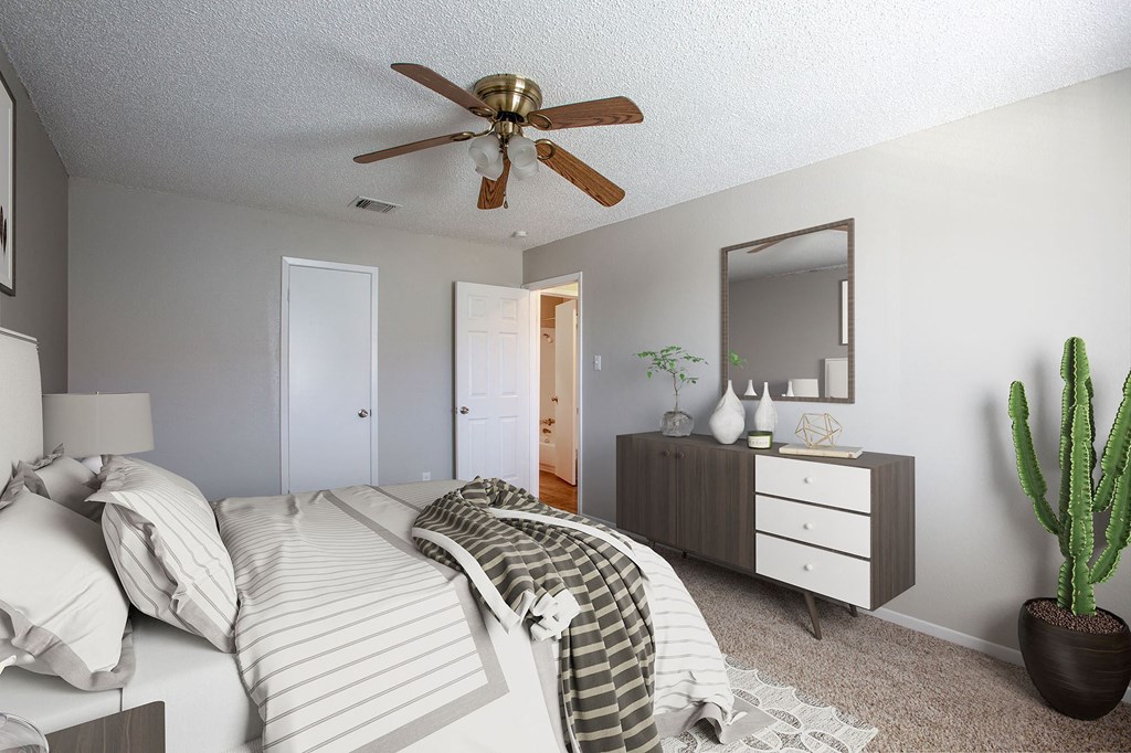 Bedroom with Ceiling Fan at The Villas at Quail Creek Apartment Homes in Austin Texas