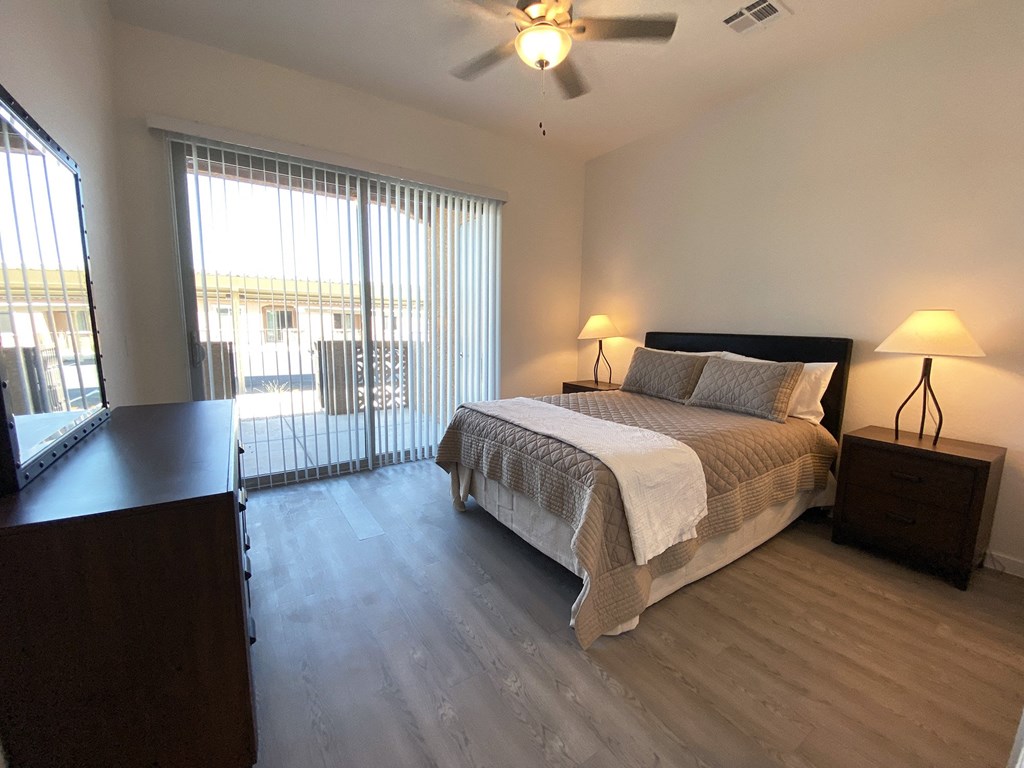 Bedroom with Patio in a 1 Bedroom and 1 Bathroom Apartment Home at Linda Vista Luxury Rentals in Oro Valley Arizona