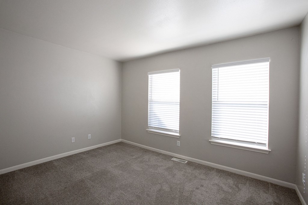 Bedroom with Window View at The Bluffs at Tierra Contenta Apartments in Santa Fe New Mexico