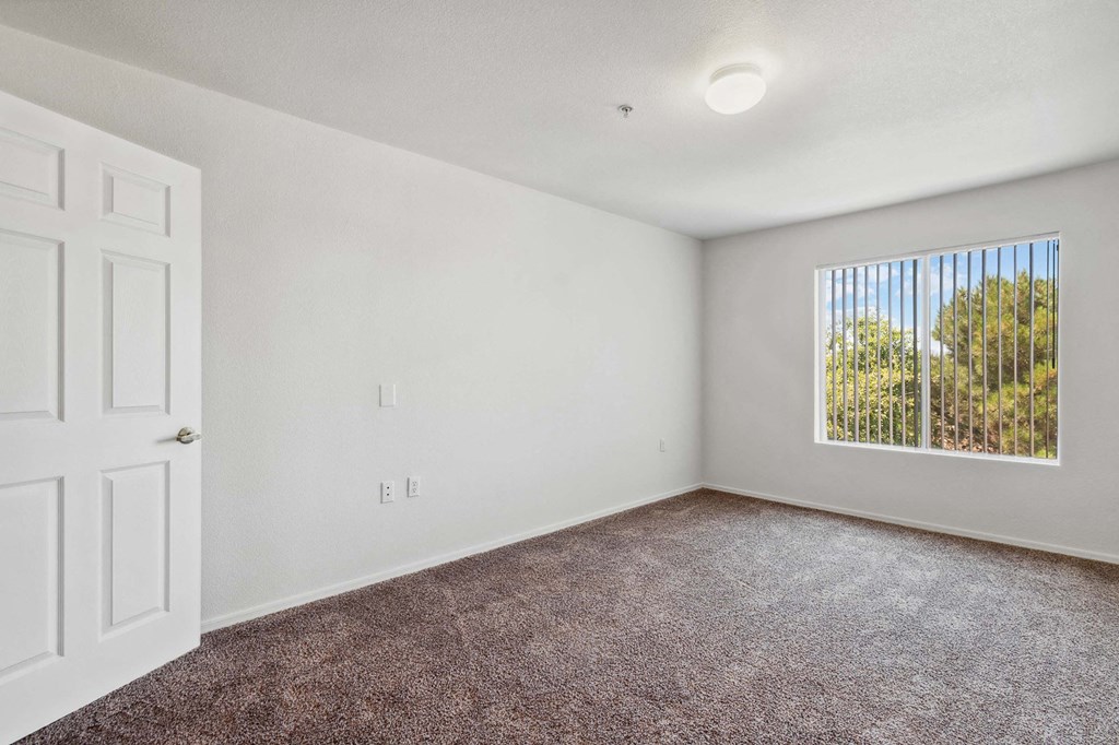 Bedroom with Window at Somerset Village in Kingman Arizona