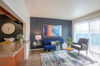 Breakfast Bar and Living Room at Midtown on Seneca Apartments - Photo Gallery 5