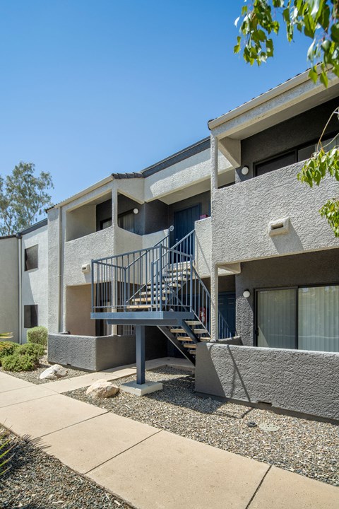 A modern house with a staircase leading to the second floor.