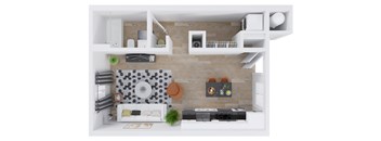 A top-down view of a modern living room with a couch, coffee table, and kitchen area.