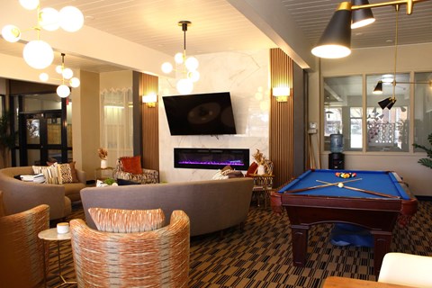 Clubhouse Seating and Billiards at Los Altos Towers Apartments in Albuquerque NM