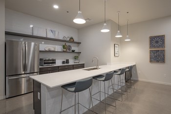 Community Clubhouse Kitchen Area at New Frontier Apartments in Phoenix Arizona - Photo Gallery 5