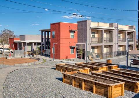 a group of wooden boxes in front of a building