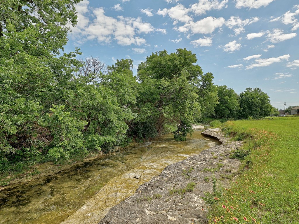 Creek at The Villas at Quail Creek Apartments in Austin Texas June 2021