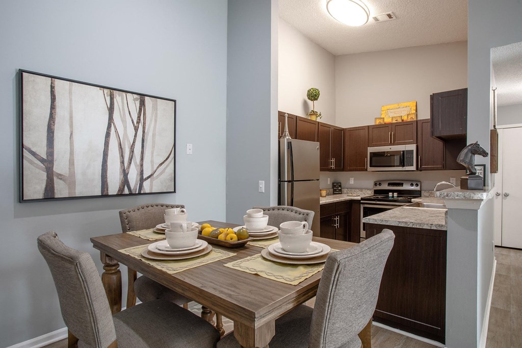 Dining Area and kitchen at Centennial Crossing Apartments in Nashville Tennessee 2024.jpg