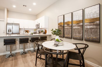 Dining area and Kitchen at The Carson Townhome Apartments - Photo Gallery 3