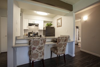 Dining area and kitchen at Tierra Pointe Apartments in Albuquerque NM October 2020 - Photo Gallery 19