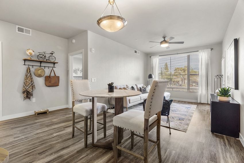 Dining area and living room at V on Broadway Apartments in Tempe AZ November 2020 - Photo Gallery
