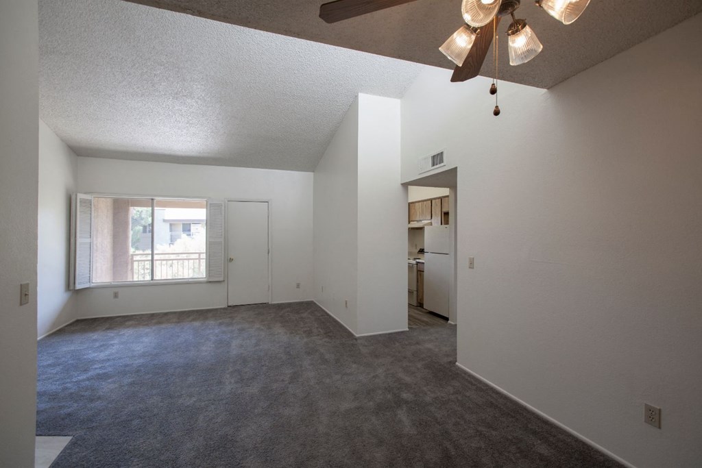 Empty living room and dining area at Sunrise Ridge Apartments in Tucson AZ