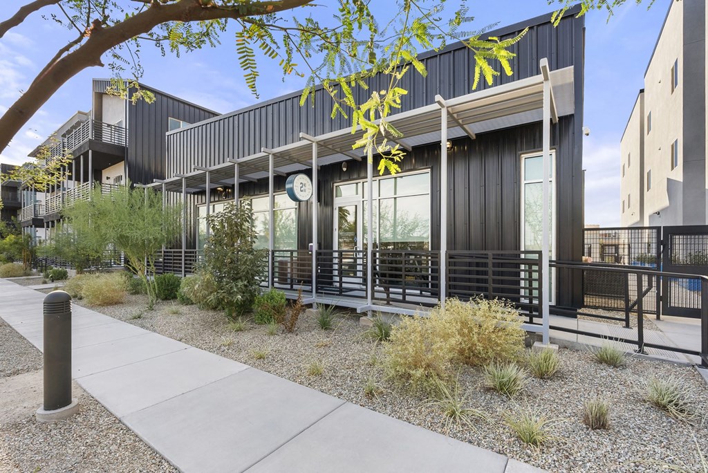 the exterior of a building with tables outside and a sidewalk at SECOND AVE COMMONS | BRAND-NEW, Arizona, 85210