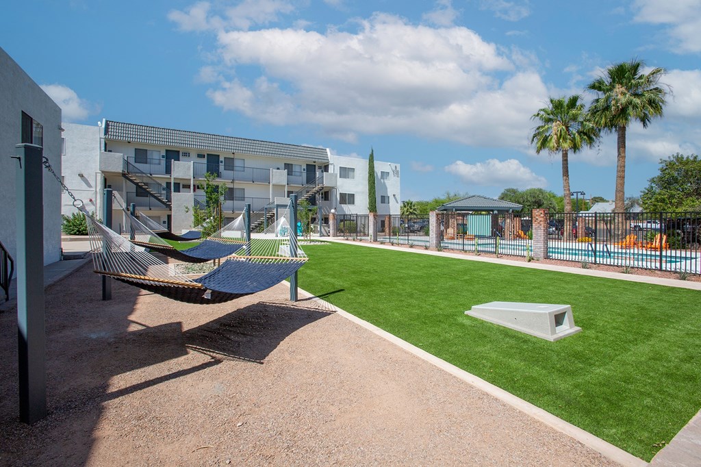 Hammock Lounge Area and Cornhole Playing Area at The Link at 4th Ave Apartments