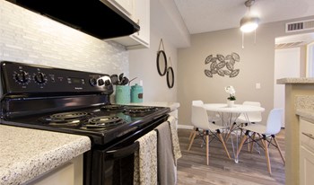 Kitchen & Dining Area at River Oaks Apartments in Tucson, AZ - Photo Gallery 13