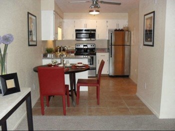 Kitchen & Dining Area at SunVilla Resort Apartments in Mesa, AZ - Photo Gallery 3