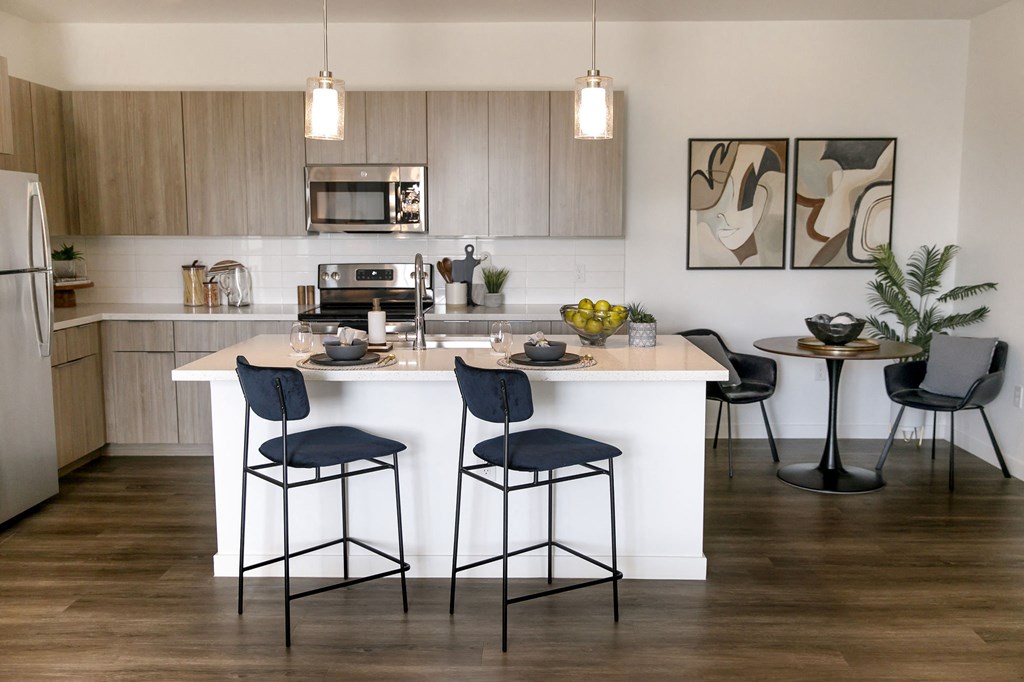 Kitchen and Dining Area at The Aster at Mountain Vista ApartmentsKitchen and Dining Area at The Aster at Mountain Vista Apartments