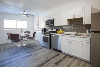 Kitchen and Dining Area at Vertical North Apartments - Photo Gallery