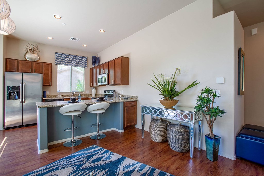 Kitchen Breakfast Bar and Living Room at Avilla Tanque Verde