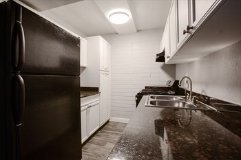 Kitchen in One Bedroom at Radius Apartments - Photo Gallery 5