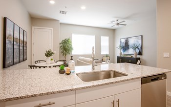 Kitchen at The Carson Townhome Apartments - Photo Gallery 6