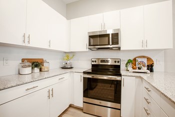 Kitchen at The Carson Townhome Apartments - Photo Gallery 5