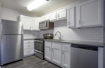 Kitchen at The Link at 4th Ave Apartments - Photo Gallery 4