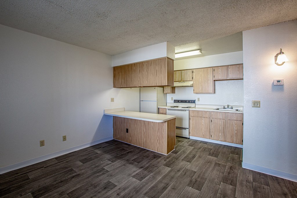 Kitchen with Breakfadst Bar at Acacia Hills Apartments in Tucson Arizona