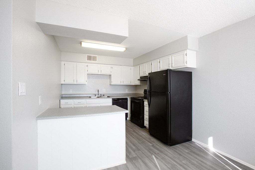 Kitchen with Breakfast Bar at The Heights at Tramway in Albuquerque New Mexico