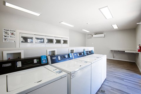 Laundry Center at Villa Esperanza Apartments in Albuquerque
