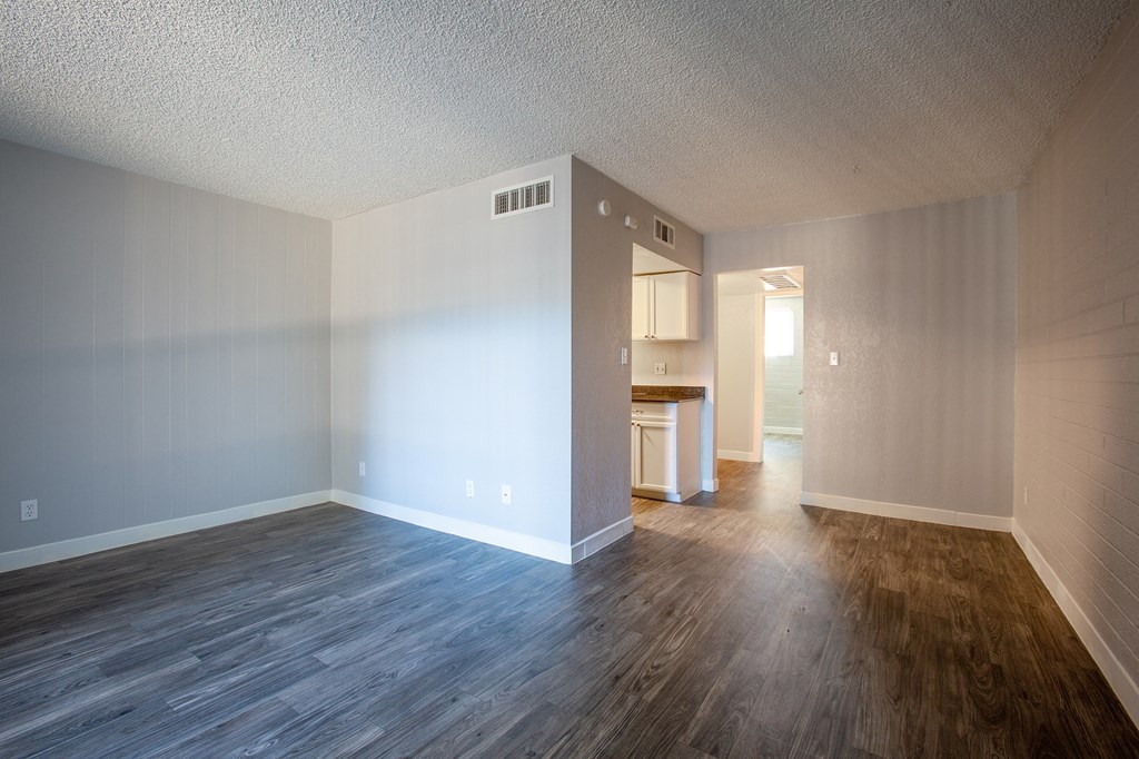 Living Room and Dining Area in One Bedroom Unit at Radius Apartments