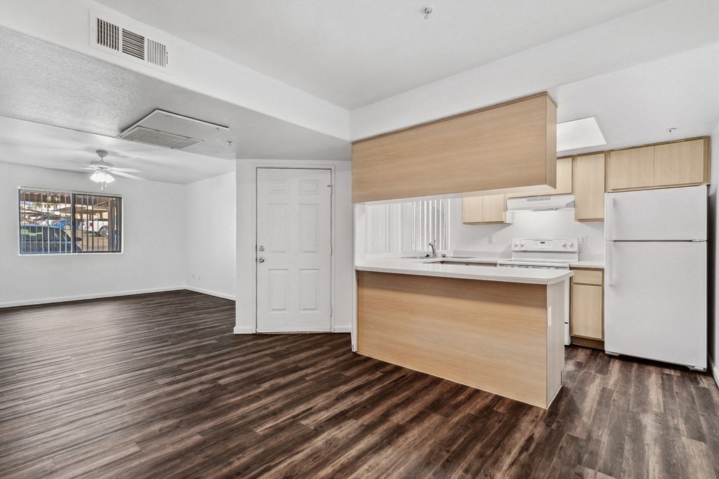 Living Room and Kitchen at Stone Ridge Apartments in Bullhead City