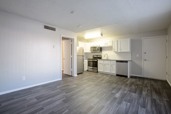 Living Room and Kitchen at The Link at 4th Ave Apartments - Photo Gallery 3