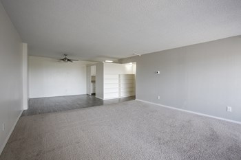 Living Room and dining area at Redondo Tower Apartments - Photo Gallery 23