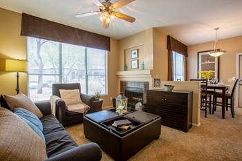 Living Room with Fireplace at Bear Canyon Apartments in Tucson Arizona 2021 - Photo Gallery 4