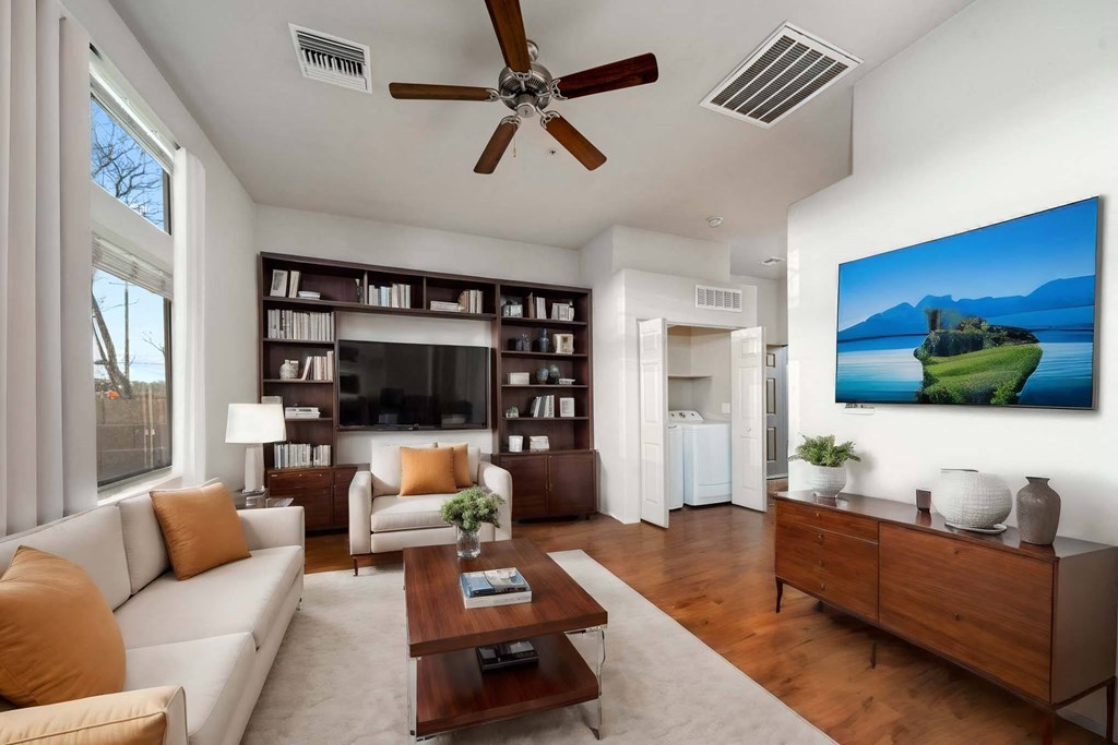 Living Room with Washer and Dryer at Avilla Preserve Apartment Homes in Tucson Arizona