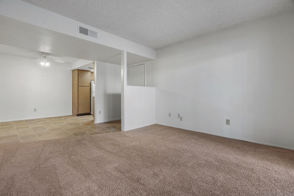 Living room and dining area at Townhomes on the Park Apartments in Phoenix AZ Nov 2020