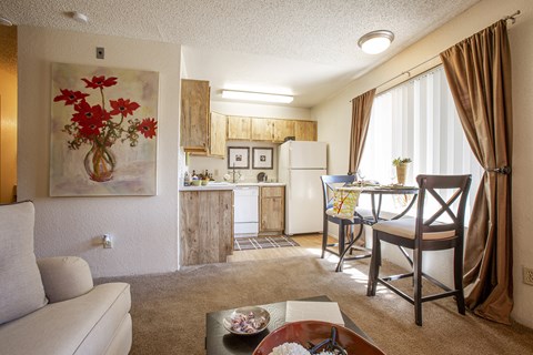Living room and dining at Comancge Wells Apartments in Albuquerque NM October 2020