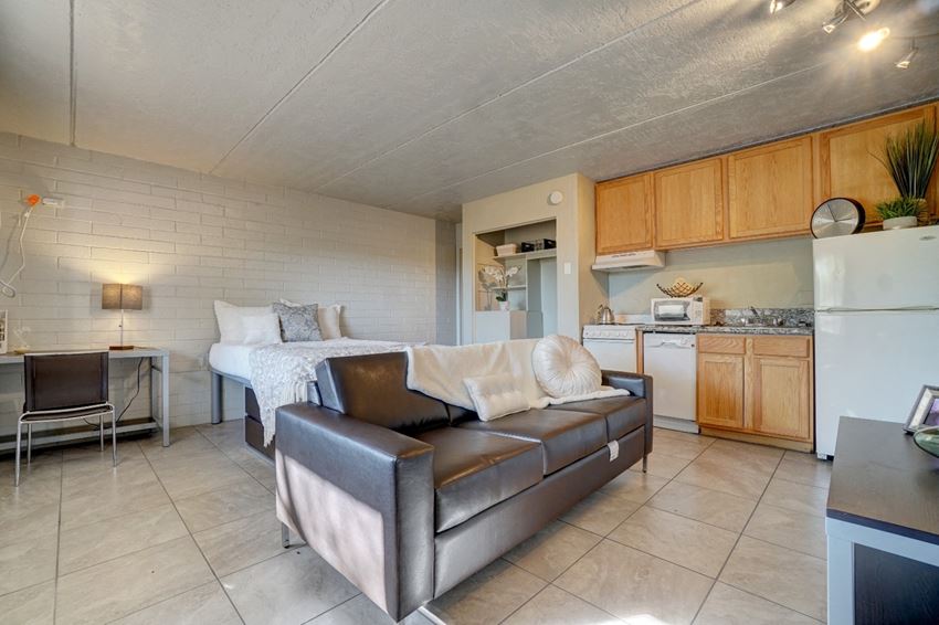 Living room & kitchen at University Manor Apartments in Tucson, AZ - Photo Gallery