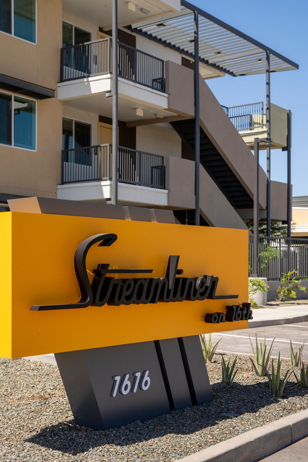 Monument Sign at Streamliner 16th Apartments in Phoenix
