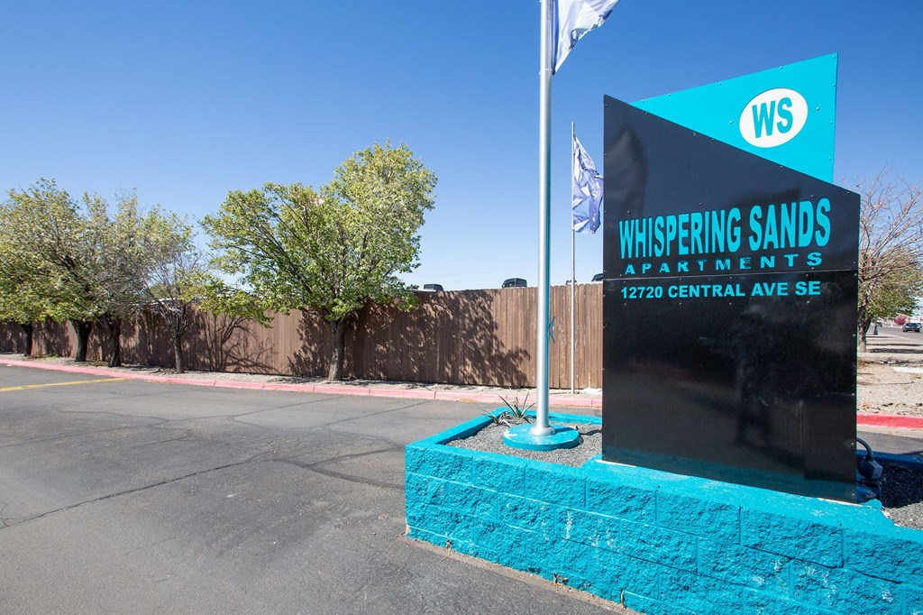 Monument Sign at Whispering Sands Apartments in Albuquerque