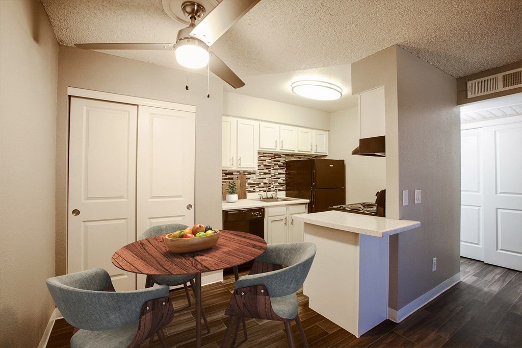 One Bedroom 625sqft dining and kitchen area at River Oaks Apartments in Tucson
