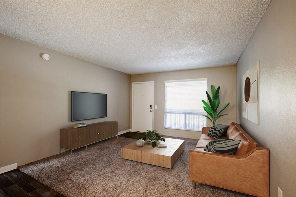 One Bedroom 625sqft living room at River Oaks Apartments in Tucson