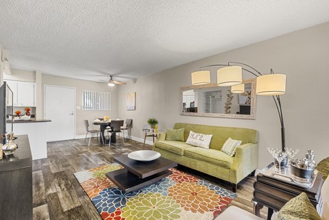 One bedroom Living room and dining area at Villa Toscana Apartments in Phoenix Arizona
