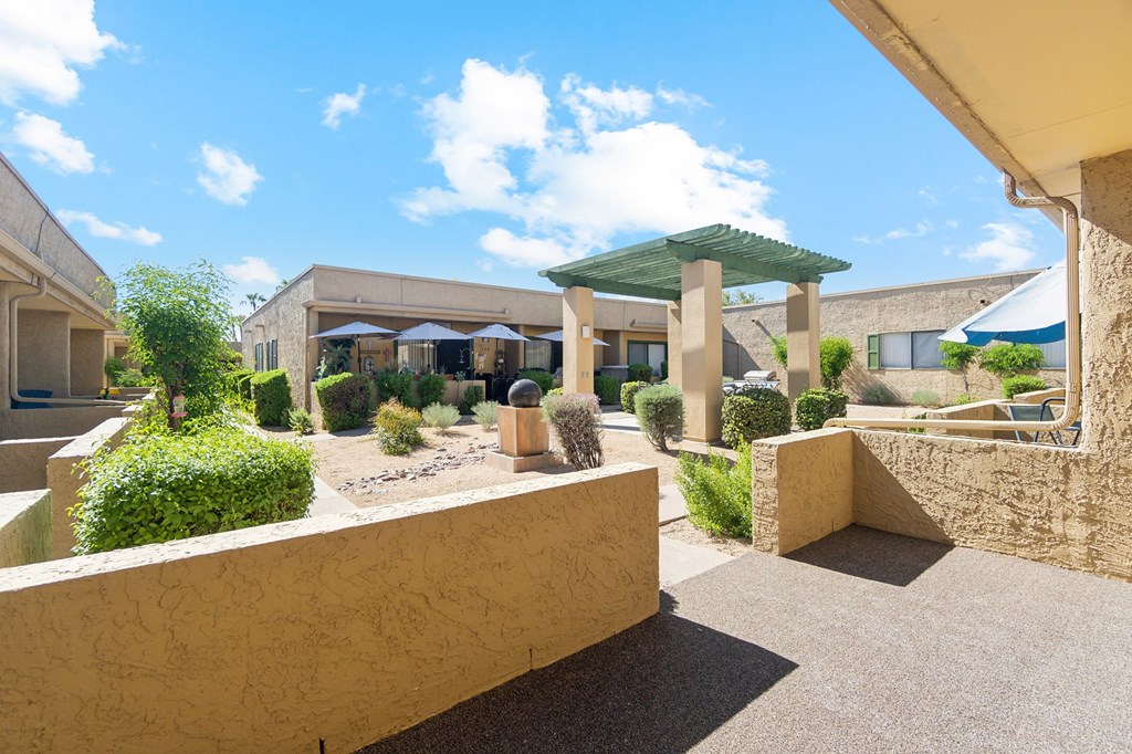 Patio with courtyard view at SunVilla Apartments in Mesa Arizona