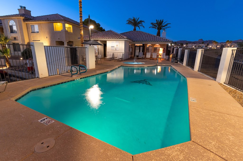 Pool at night at Stone RIdge Apartments in Bullhead City